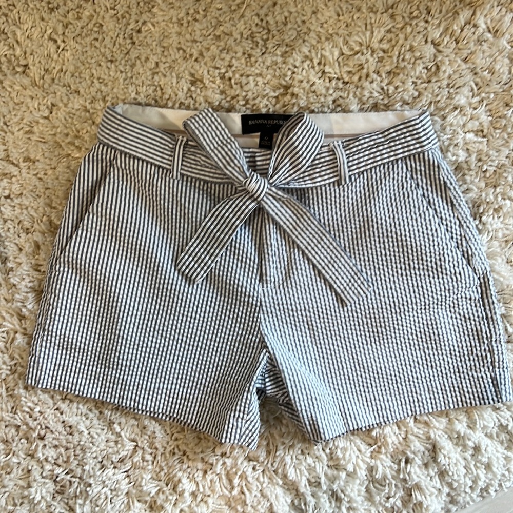 Banana Republic chino-style blue and white striped shorts.